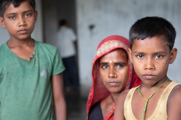 Portrait of a Nepalese woman and her two sons. Credit: Andie Tucker