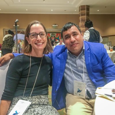 Courtenay Dusenbury and Amar Timalsina smile for a photo at the International Leprosy Congress.