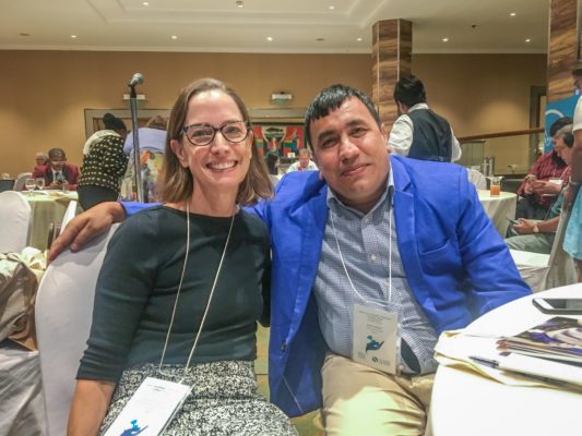 Courtenay Dusenbury and Amar Timalsina smile for a photo at the International Leprosy Congress.