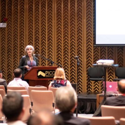 Christine Fenenga speaks at the International Leprosy Congress. Photo credit: Andie Tucker