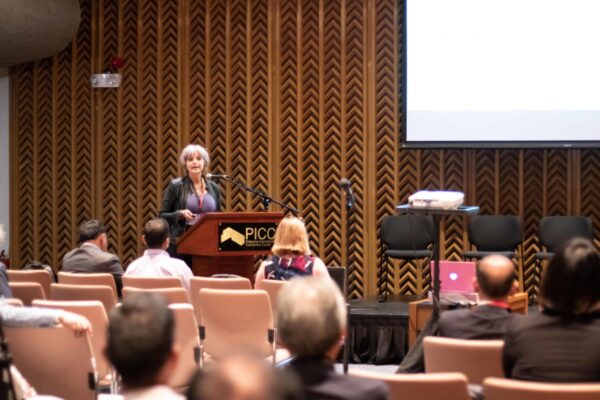 Christine Fenenga speaks at the International Leprosy Congress. Photo credit: Andie Tucker